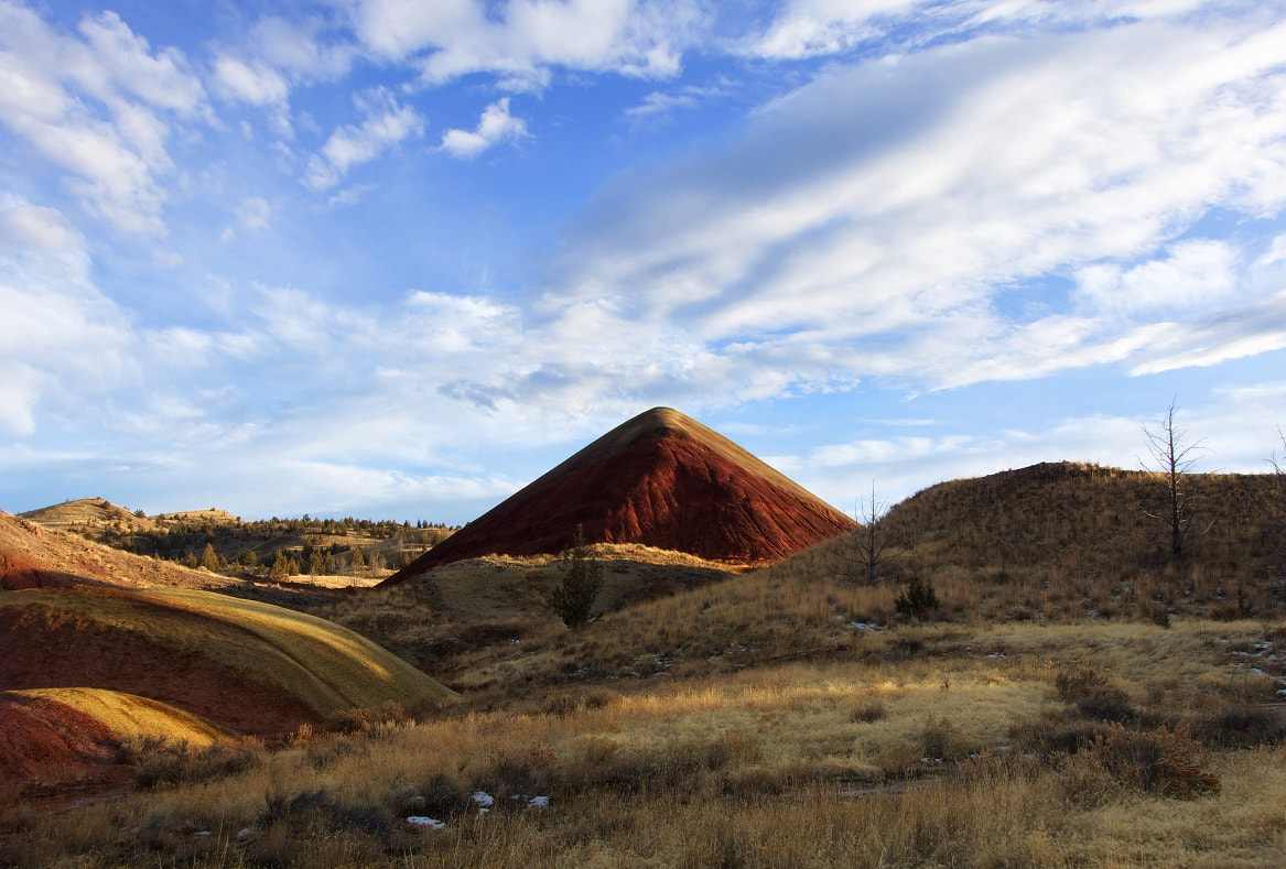 Cool blue, winter sky at Red Hill in the Painted Hills of Oregon